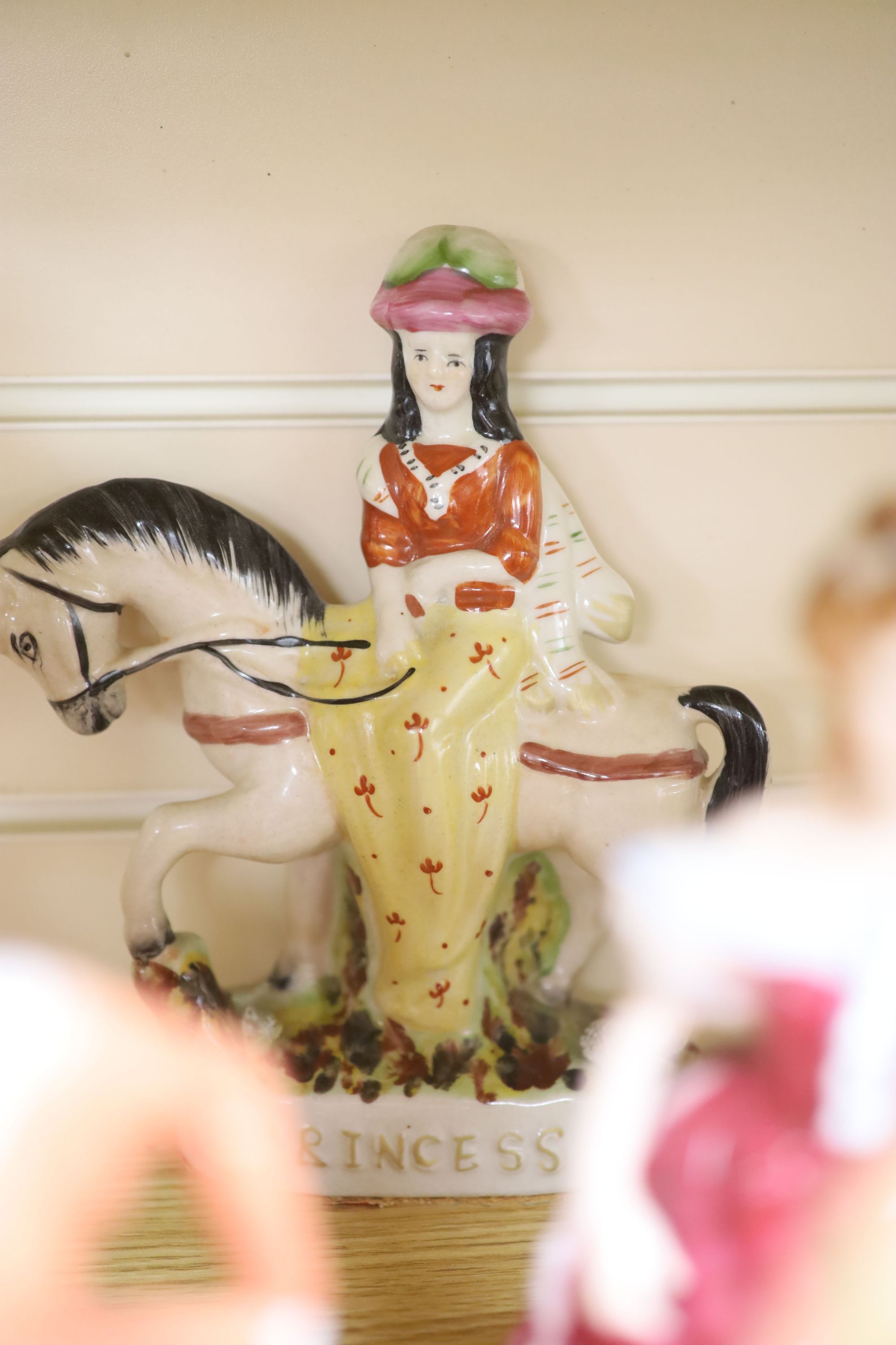 Five Royal Doulton porcelain ladies, two Coalport, one Worcester, another porcelain lady and a Staffordshire figure